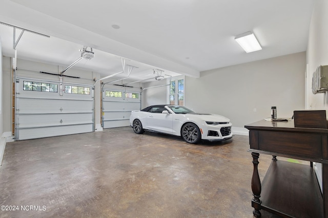 garage featuring a garage door opener