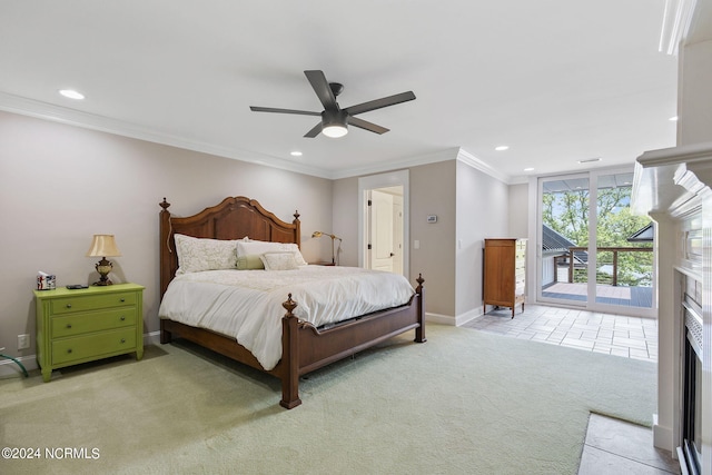 carpeted bedroom with access to exterior, ceiling fan, and crown molding