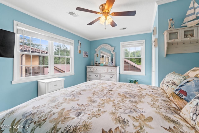 1491 Lanvale Rd NE, Leland, NC 28451 - bedroom featuring visible vents, a ceiling fan, and ornamental molding