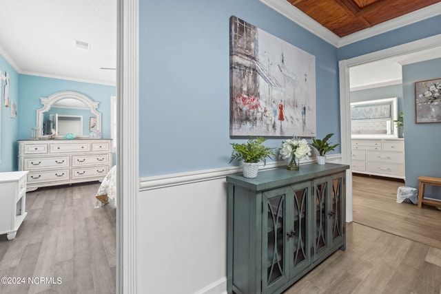 1491 Lanvale Rd NE, Leland, NC 28451 - hallway with ornamental molding, wood finished floors, and visible vents