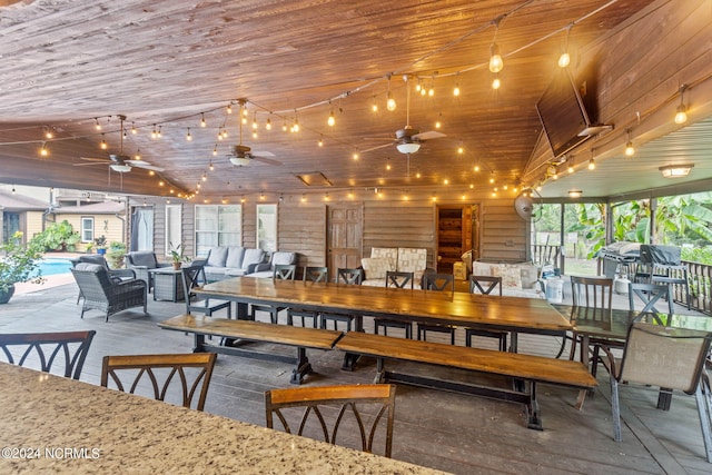1491 Lanvale Rd NE, Leland, NC 28451 - dining space with lofted ceiling, wood ceiling, and a ceiling fan