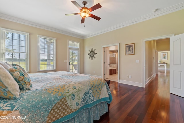 bedroom featuring ensuite bathroom, a ceiling fan, baseboards, ornamental molding, and dark wood-style floors