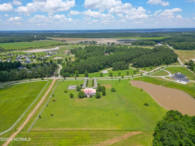 birds eye view of property featuring a rural view