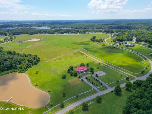 birds eye view of property with a rural view