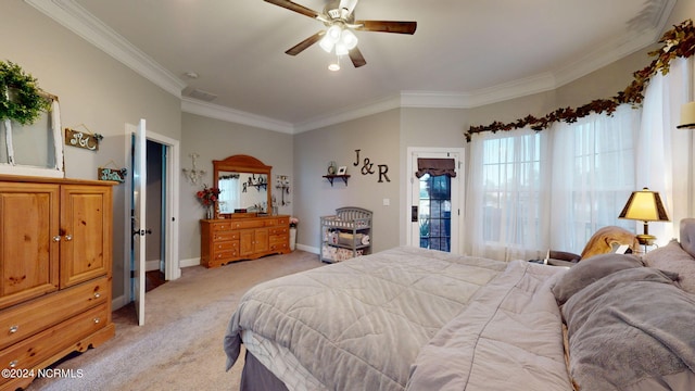 bedroom featuring ornamental molding, light carpet, and ceiling fan