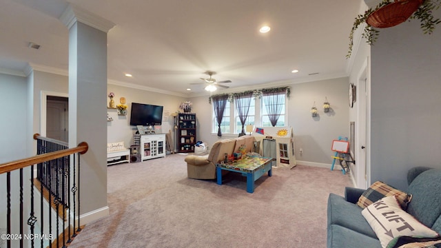 carpeted living room featuring crown molding and ceiling fan