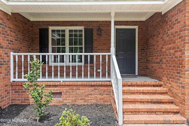 property entrance with a porch