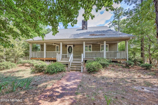 farmhouse inspired home with a porch