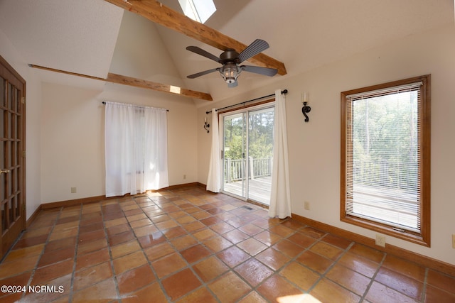 tiled empty room with baseboards, ceiling fan, high vaulted ceiling, and beamed ceiling