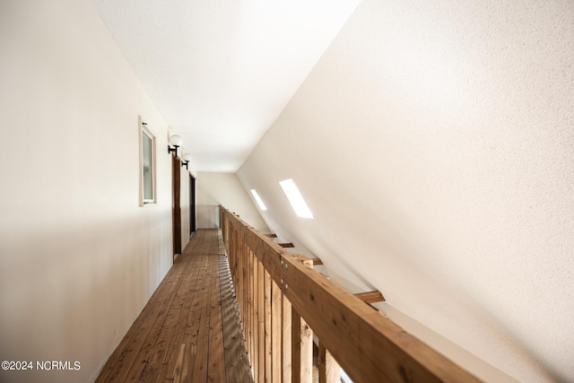 hallway featuring dark wood finished floors