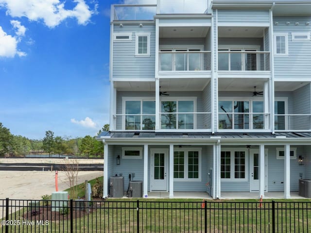 2601 Alvernia Dr, Castle Hayne, NC 28429 - rear view of property featuring a balcony, ceiling fan, central AC, a standing seam roof, and metal roof