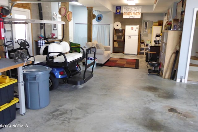 garage featuring white refrigerator