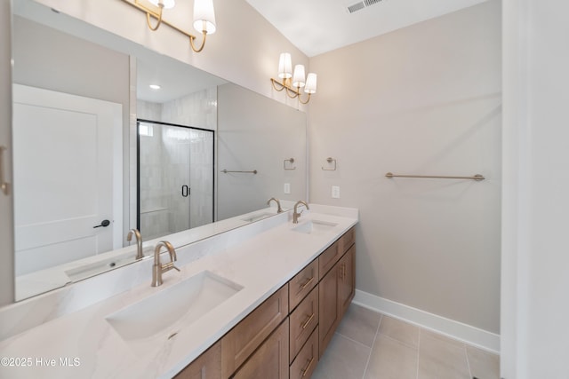 2597 Alvernia Dr, Castle Hayne, NC 28429 - full bath featuring double vanity, tile patterned flooring, and a stall shower