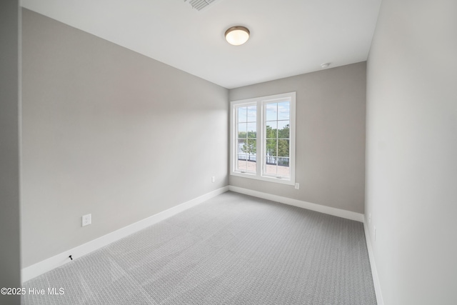 2597 Alvernia Dr, Castle Hayne, NC 28429 - empty room featuring carpet floors and baseboards