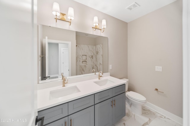 2597 Alvernia Dr, Castle Hayne, NC 28429 - full bathroom featuring marble finish flooring, double vanity, and a marble finish shower