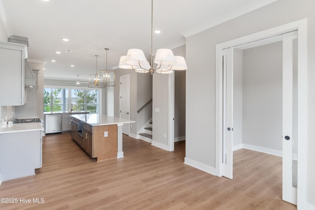 2597 Alvernia Dr, Castle Hayne, NC 28429 - kitchen featuring dishwasher, light countertops, ornamental molding, light wood finished floors, and recessed lighting