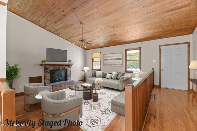 living room featuring wood ceiling, vaulted ceiling, and light wood-type flooring