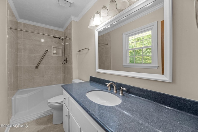 full bathroom featuring crown molding, tiled shower / bath, vanity, and toilet