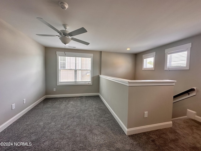 207 Eaton St, Carthage, NC 28327 - empty room featuring carpet, a ceiling fan, baseboards, and a smoke detector