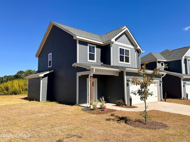 view of front of home with a garage, concrete driveway, and board and batten siding