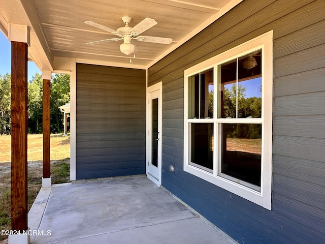 view of patio featuring a ceiling fan