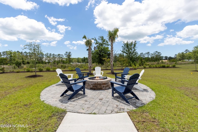 view of patio featuring an outdoor fire pit