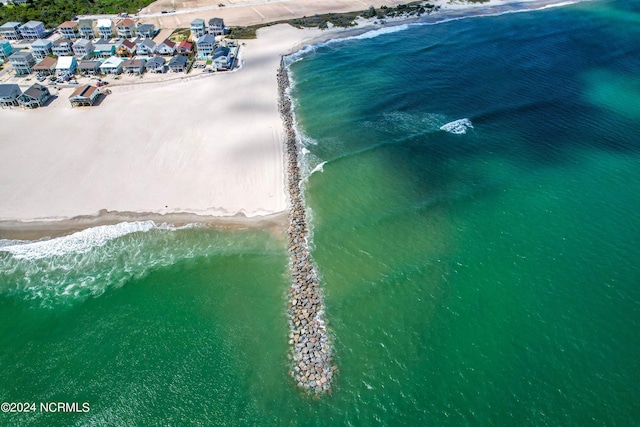 aerial view featuring a water view and a view of the beach