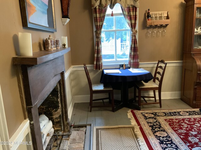 dining room with a wealth of natural light and light hardwood / wood-style flooring