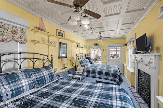 bedroom with ceiling fan and coffered ceiling