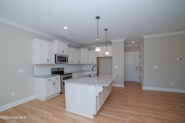 kitchen with white cabinetry, appliances with stainless steel finishes, and light hardwood / wood-style flooring