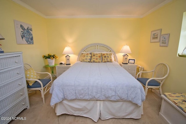 carpeted bedroom featuring ornamental molding