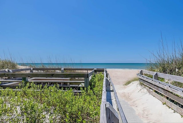 water view featuring a beach view