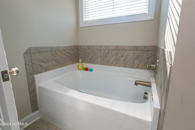 bathroom featuring a tub