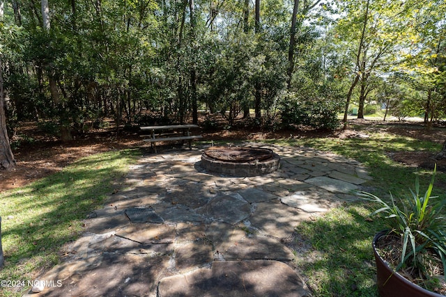 view of patio featuring an outdoor fire pit