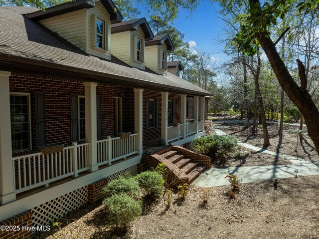 view of patio / terrace with a fire pit