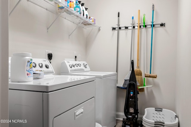 washroom featuring washer and dryer