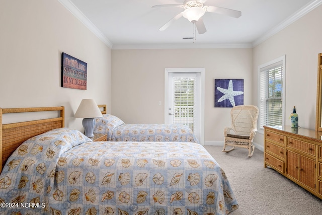 carpeted bedroom with multiple windows, ceiling fan, and ornamental molding