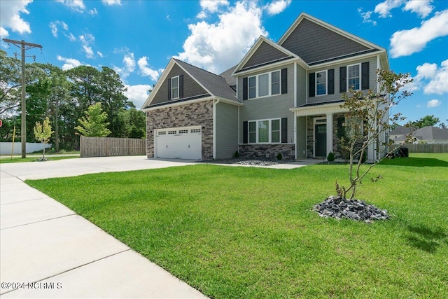 craftsman-style home featuring a garage and a front yard