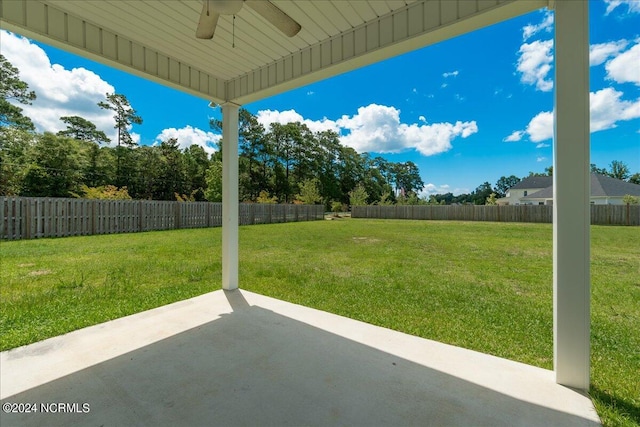 view of patio featuring ceiling fan