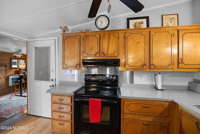 kitchen featuring ornamental molding, brown cabinets, vaulted ceiling, under cabinet range hood, and black range with electric cooktop