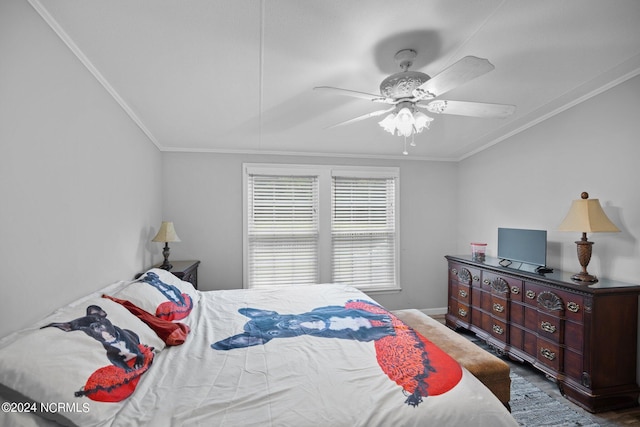 bedroom with ceiling fan, baseboards, and crown molding