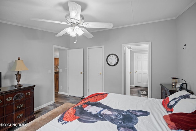 bedroom featuring ceiling fan, crown molding, baseboards, and wood finished floors