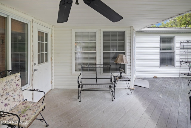 wooden terrace with ceiling fan