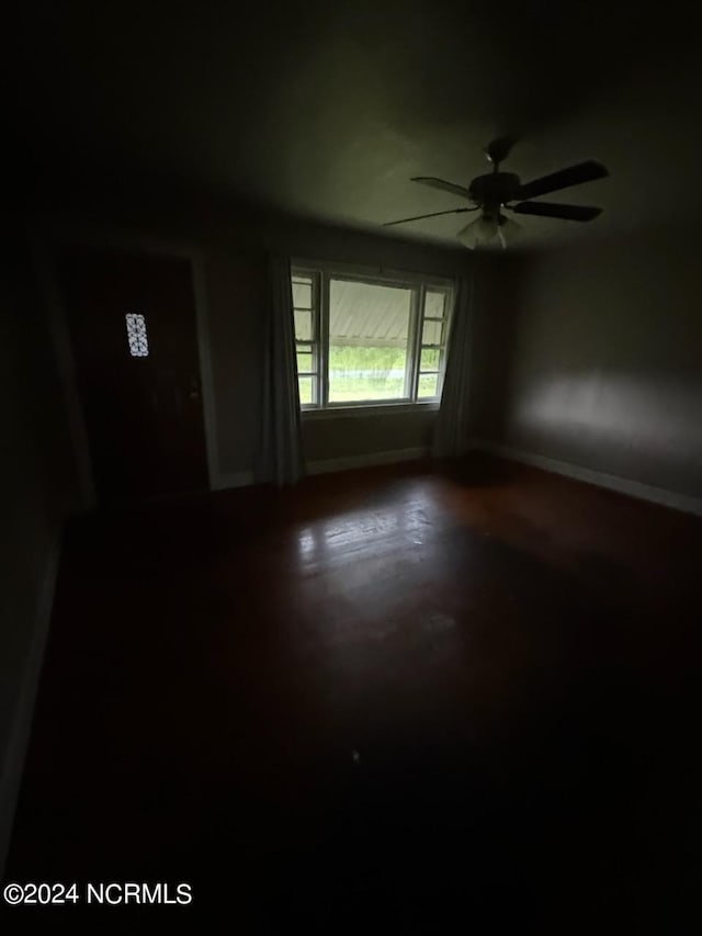 spare room with ceiling fan