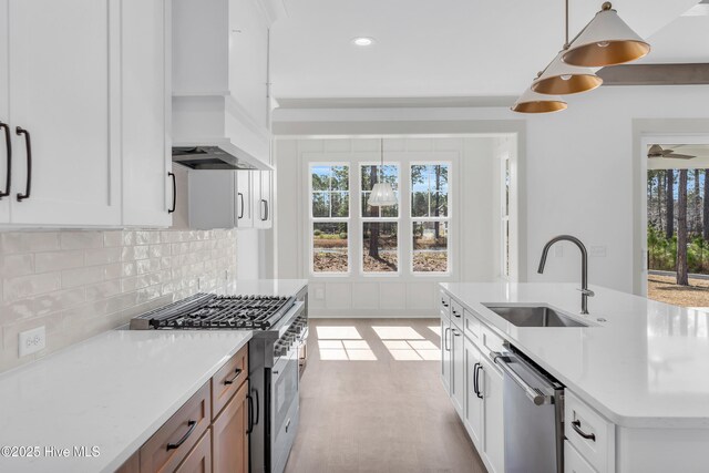 drone / aerial view featuring a residential view, a view of trees, and a water view