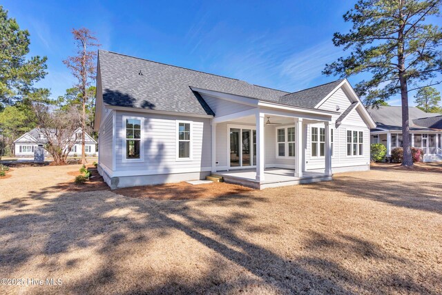 unfurnished bedroom with wood finished floors, visible vents, baseboards, ensuite bath, and ornamental molding