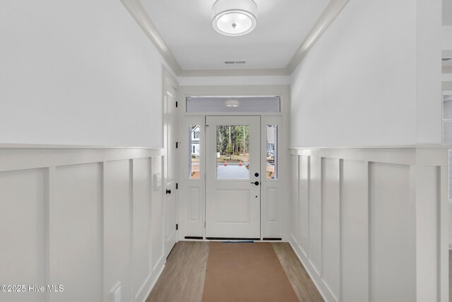 back of property featuring a patio area, a shingled roof, stucco siding, and fence