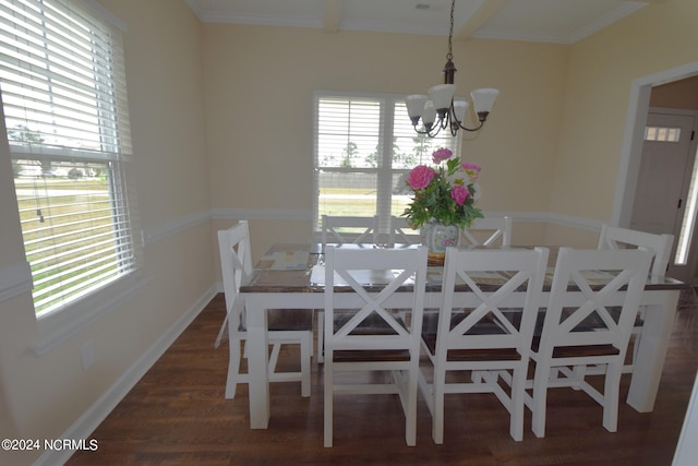 unfurnished dining area featuring dark hardwood / wood-style floors, a notable chandelier, a wealth of natural light, and ornamental molding