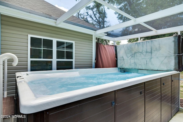 view of patio / terrace featuring a hot tub