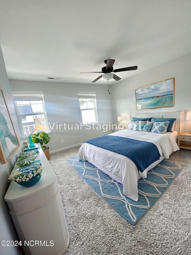 carpeted bedroom featuring ceiling fan